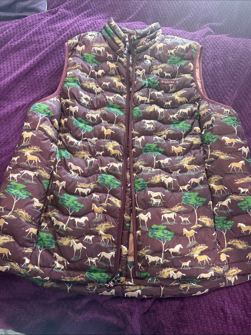 Ariat Woman’s Brown Puffer Vest with Green and Tan Horse Print